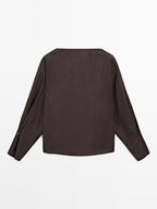 Flowing blouse with button details