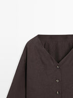 Flowing blouse with button details