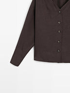 Flowing blouse with button details