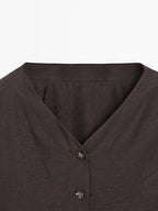 Flowing blouse with button details