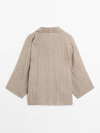 Flowing linen blend blouse with open neckline