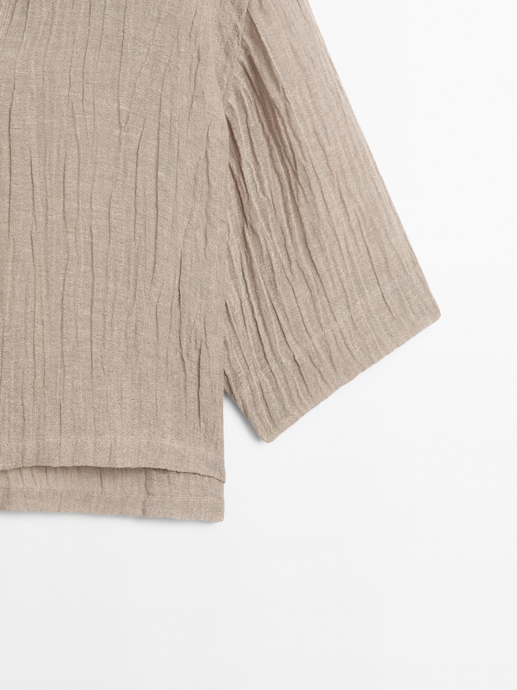 Flowing linen blend blouse with open neckline