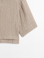 Flowing linen blend blouse with open neckline