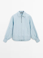 Oversize denim blouse with puff sleeves