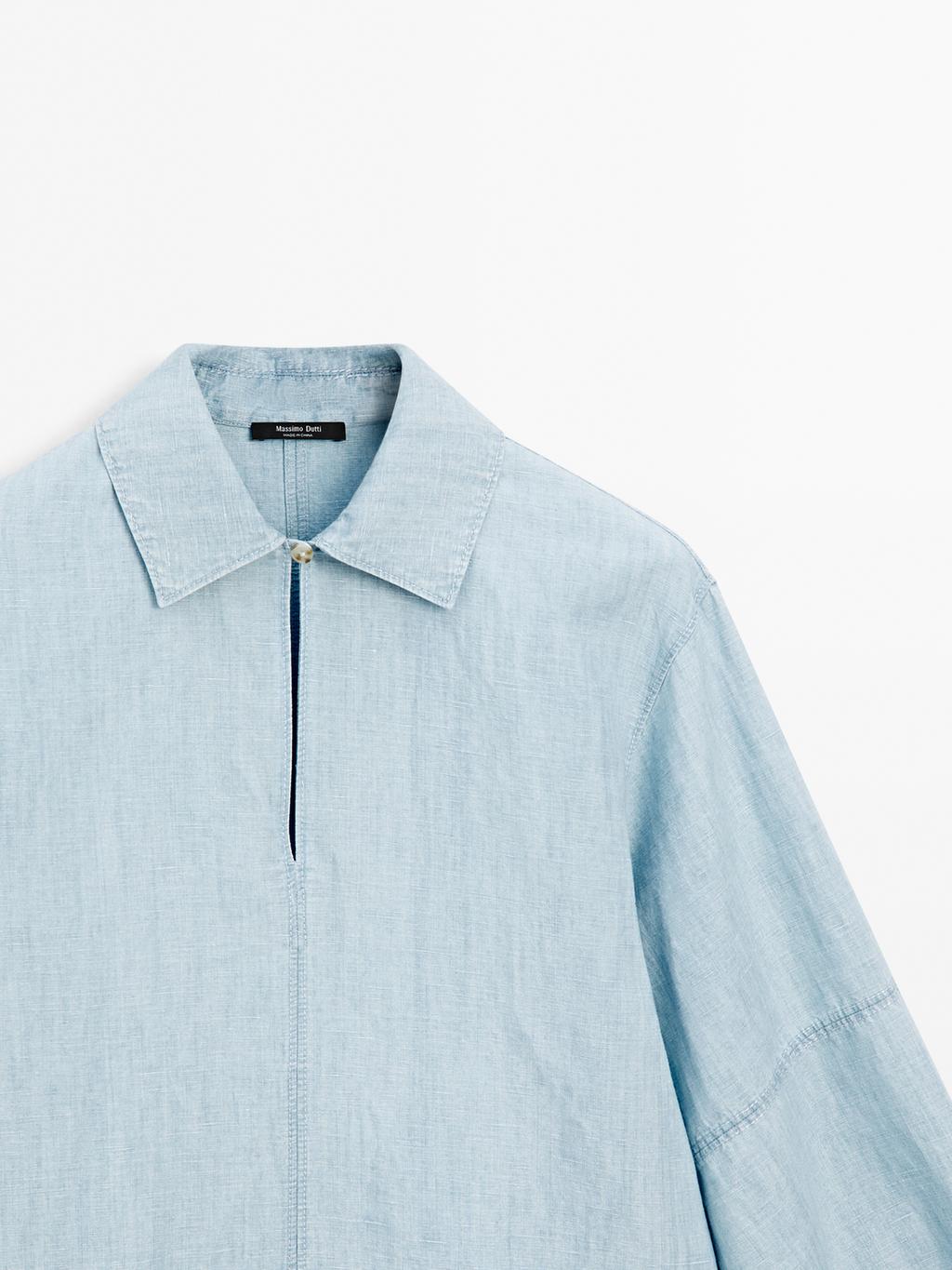 Oversize denim blouse with puff sleeves