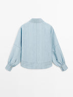 Oversize denim blouse with puff sleeves