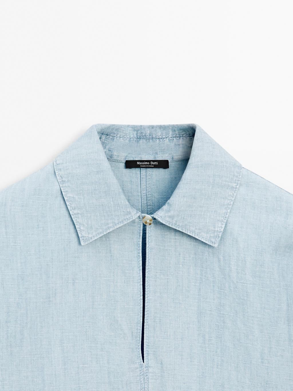 Oversize denim blouse with puff sleeves