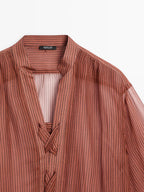 Semi-sheer shirt with tie detail