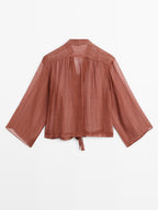 Semi-sheer shirt with tie detail