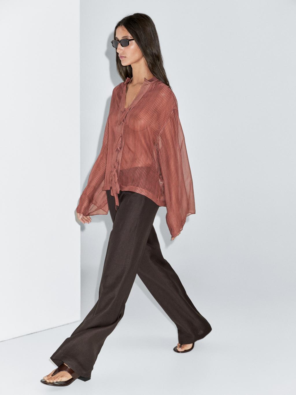 Semi-sheer shirt with tie detail