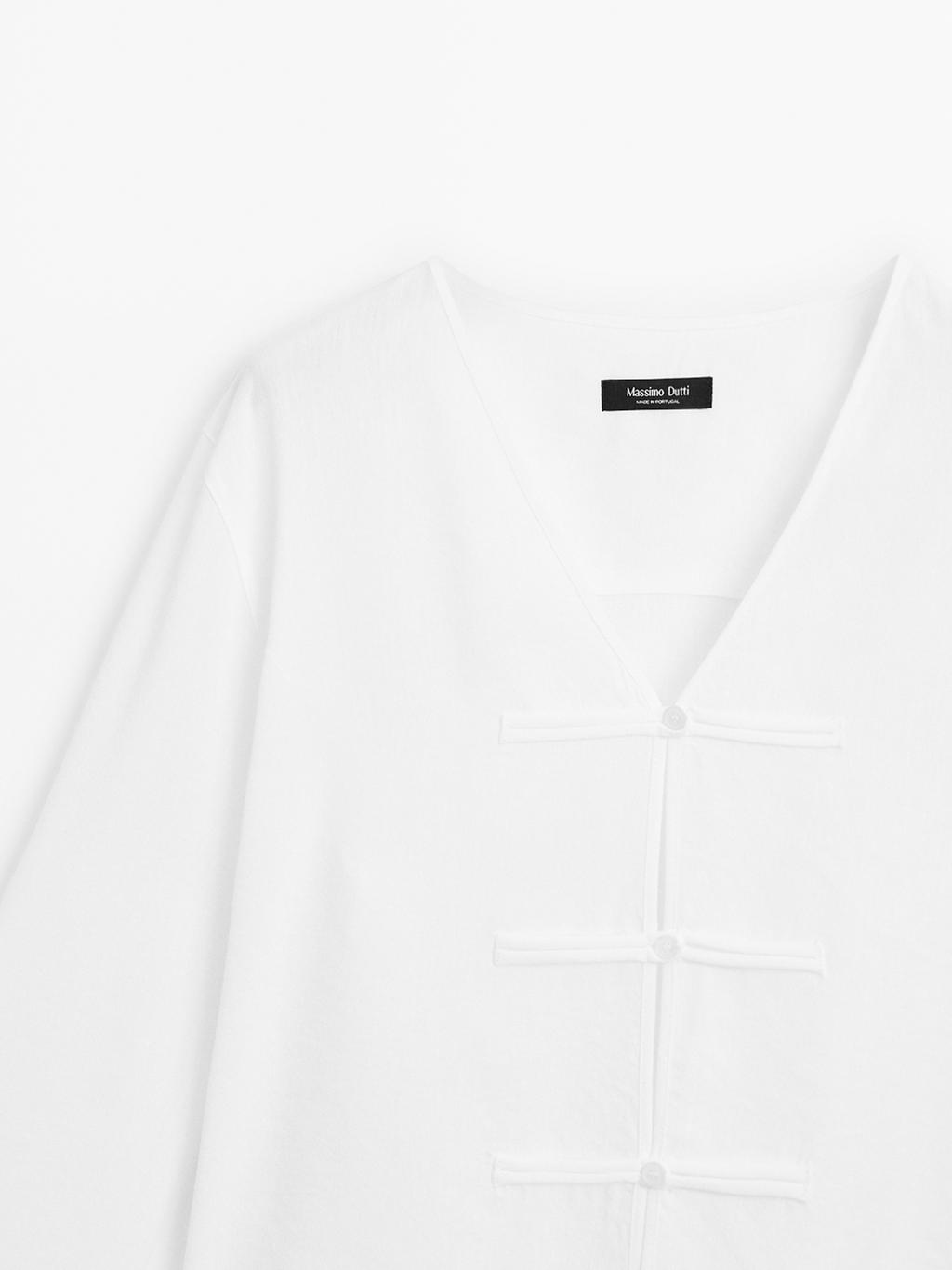 Flowing linen blend blouse with V-neckline