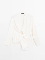 Blouse with knotted neckline and brooch detail