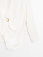 Blouse with knotted neckline and brooch detail