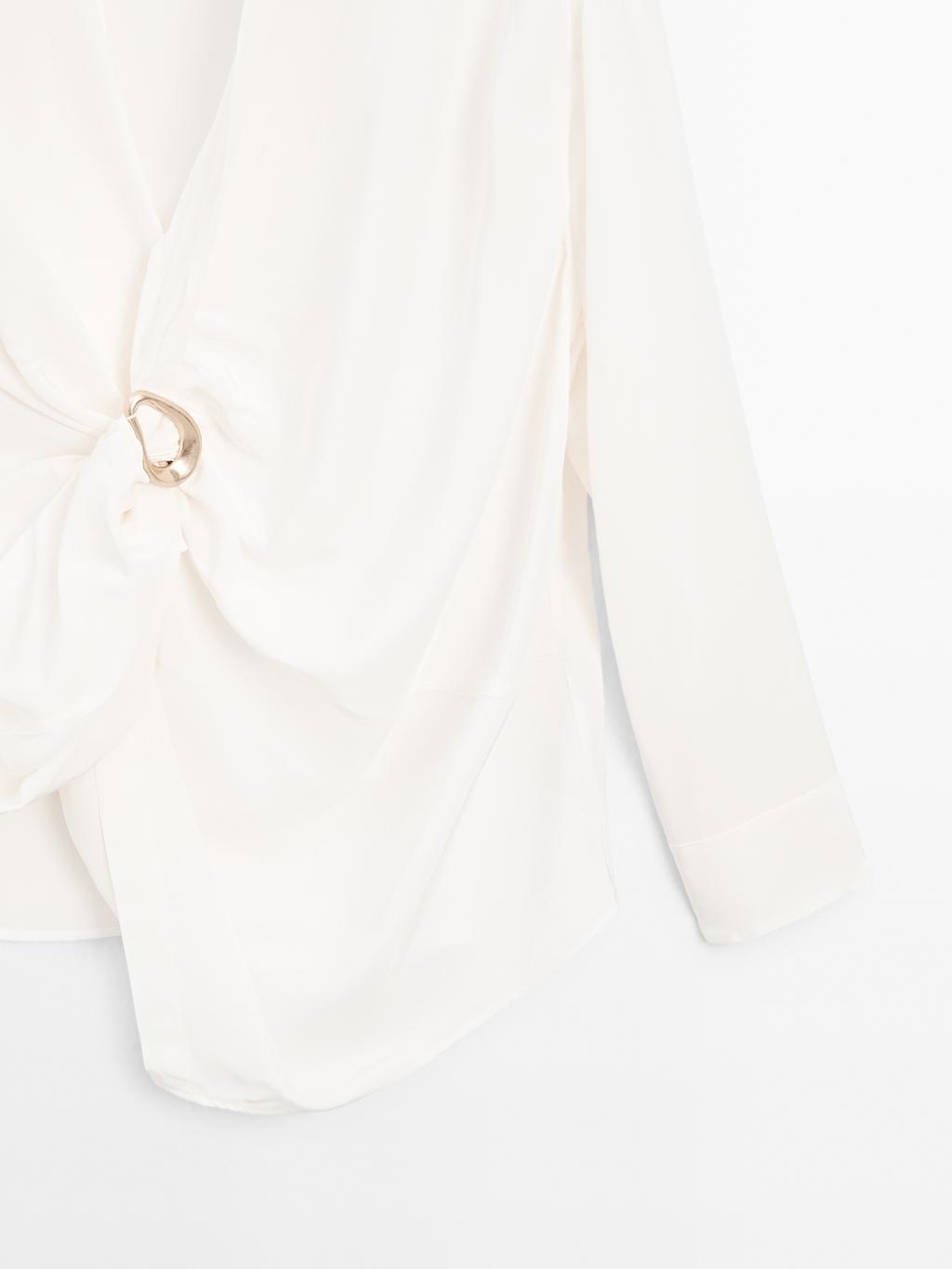 Blouse with knotted neckline and brooch detail