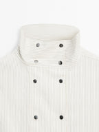Flowing shirt with button detail on the chest