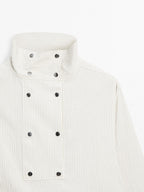 Flowing shirt with button detail on the chest
