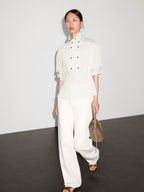 Flowing shirt with button detail on the chest