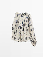 Asymmetric flowing floral print blouse