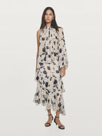 Asymmetric flowing floral print blouse