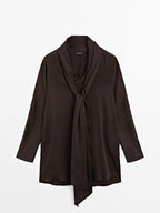 Long flowing blouse with tied neck