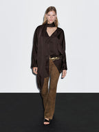 Long flowing blouse with tied neck