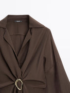 Long shirt with brooch detail