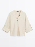 Shirt with rolled-up sleeves