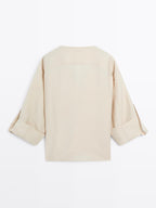 Shirt with rolled-up sleeves