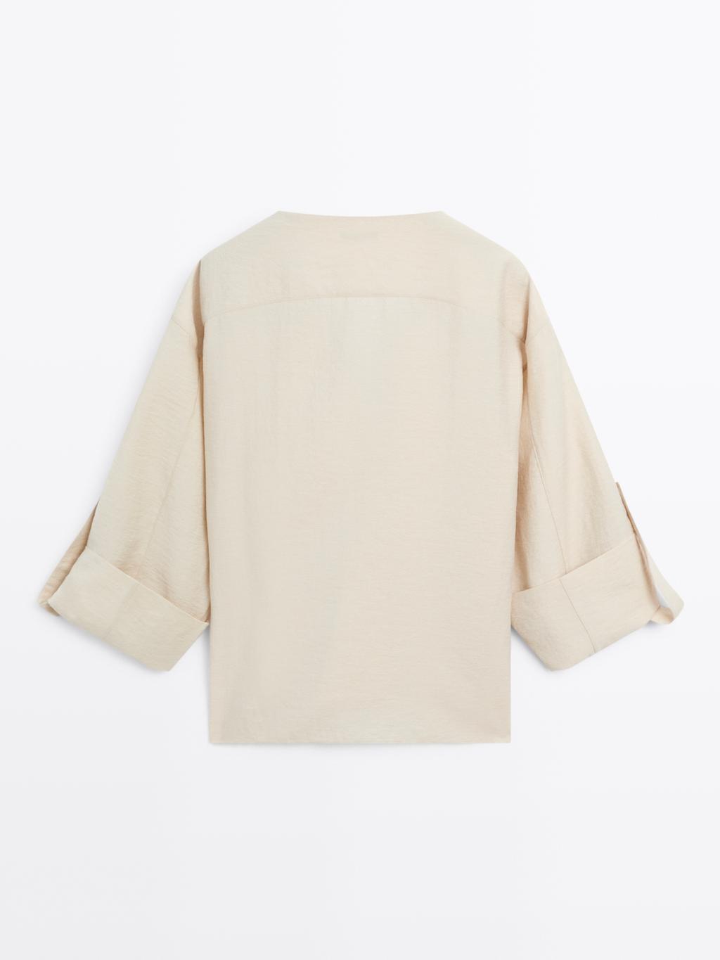 Shirt with rolled-up sleeves