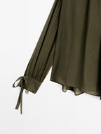 Cape blouse with ties