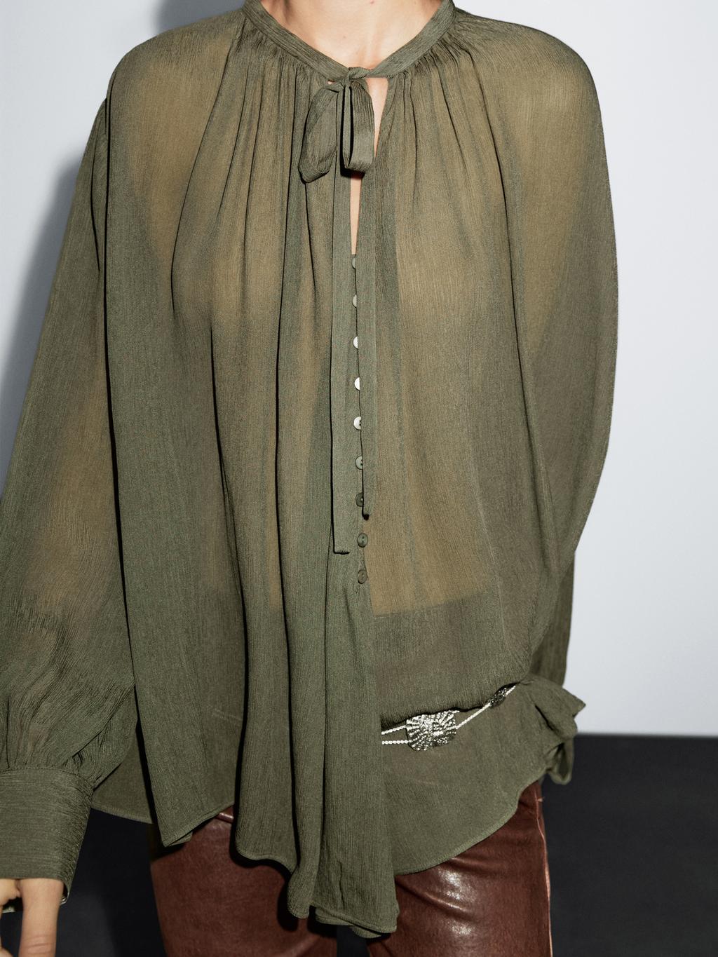 Cape blouse with ties