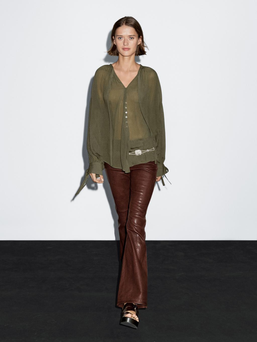 Cape blouse with ties