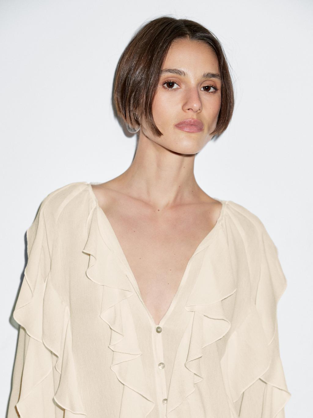 Flowing blouse with ruffles