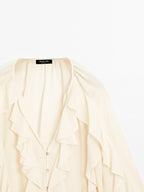 Flowing blouse with ruffles