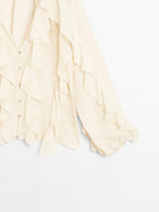 Flowing blouse with ruffles