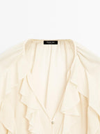 Flowing blouse with ruffles