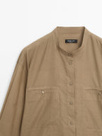 Long shirt with stand collar