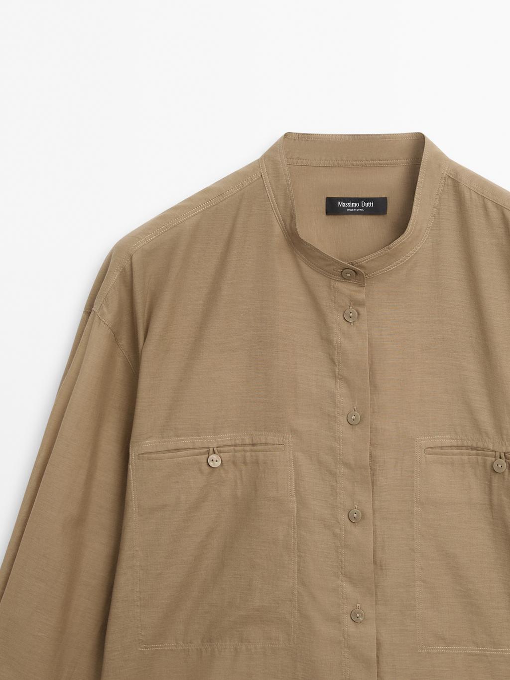 Long shirt with stand collar