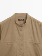 Long shirt with stand collar