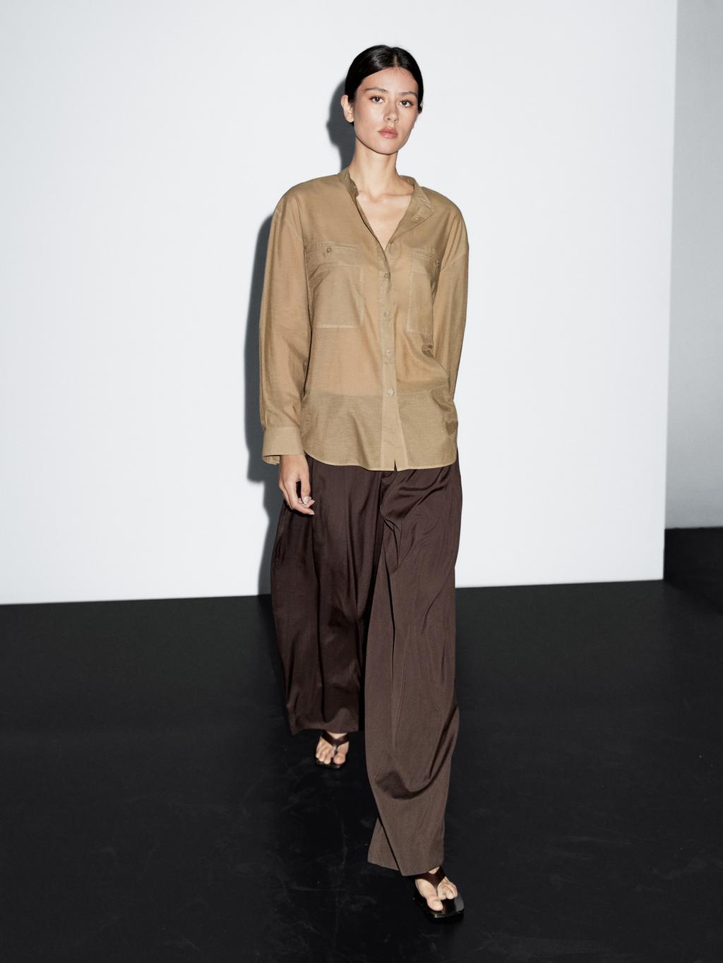 Long shirt with stand collar