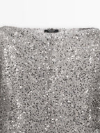 Sequinned blouse with cowl neck