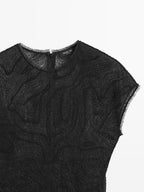 Semi-sheer embroidered top