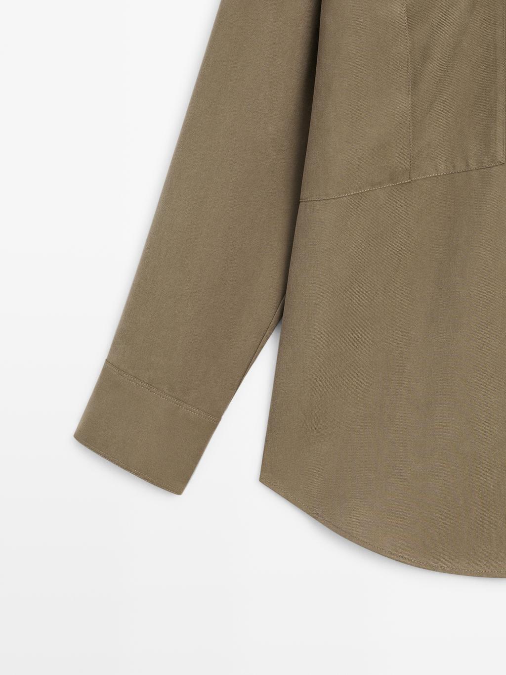 Long shirt with pocket details