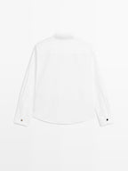 Stand collar shirt with gold buttons