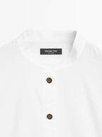 Stand collar shirt with gold buttons
