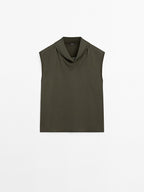 Flowing blouse with draped neck detail