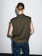 Flowing blouse with draped neck detail