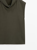 Flowing blouse with draped neck detail