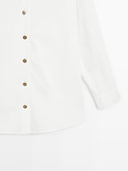 Poplin shirt with golden buttons