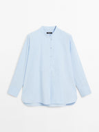 Shirt with stand collar and bib